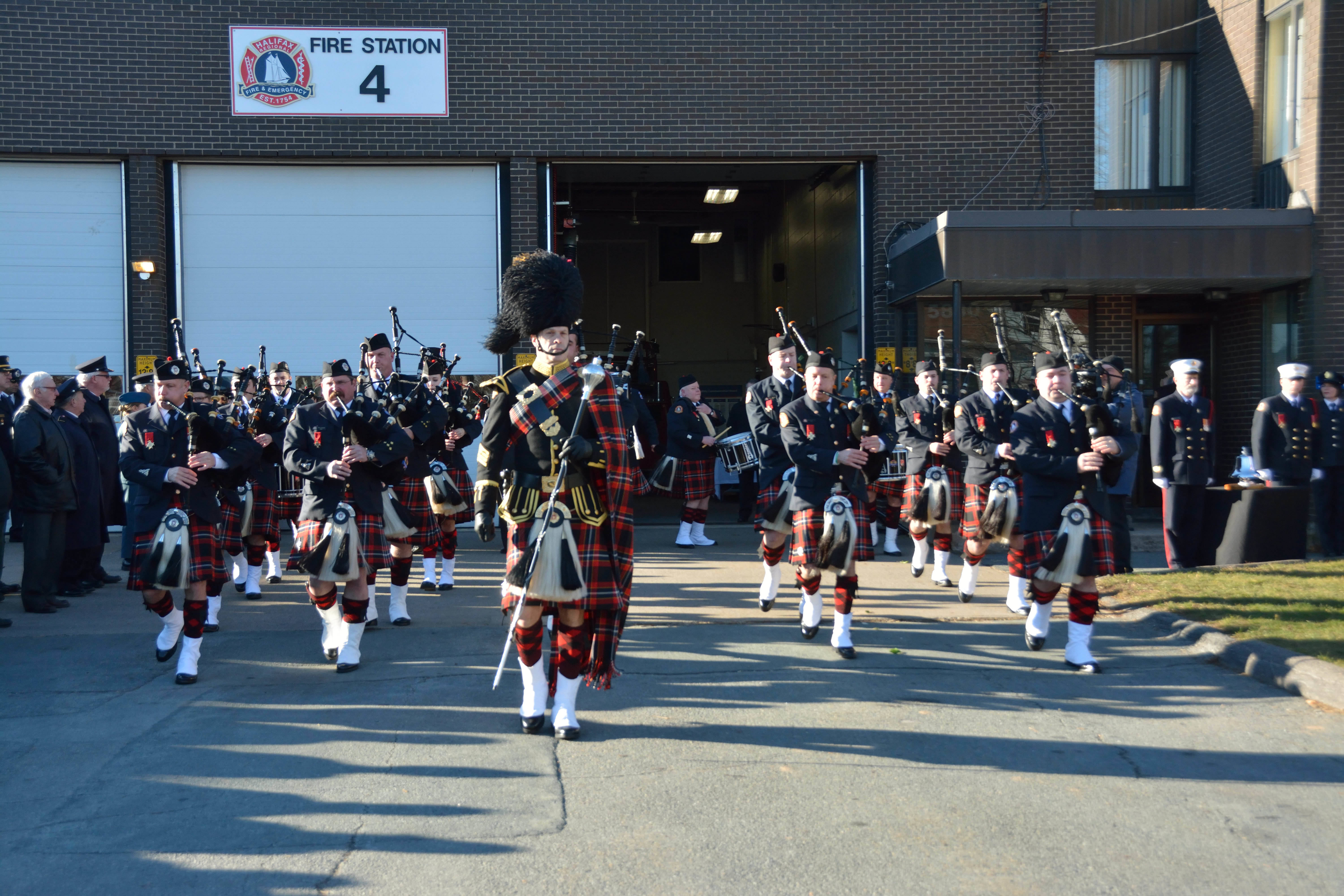 A photo of the Union Fire Club Pipes and Drums playing at the 2016 Halifax Explosion Memorial service at Station 4.