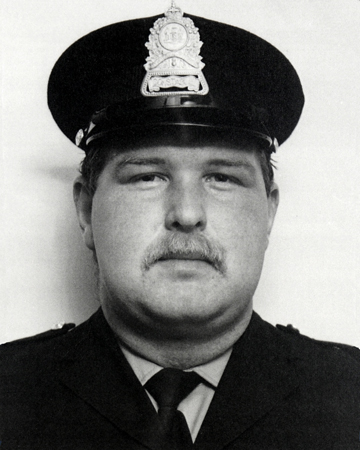 Photo of Constable Sigurd Holtan wearing a Halifax Regional Police forage cap