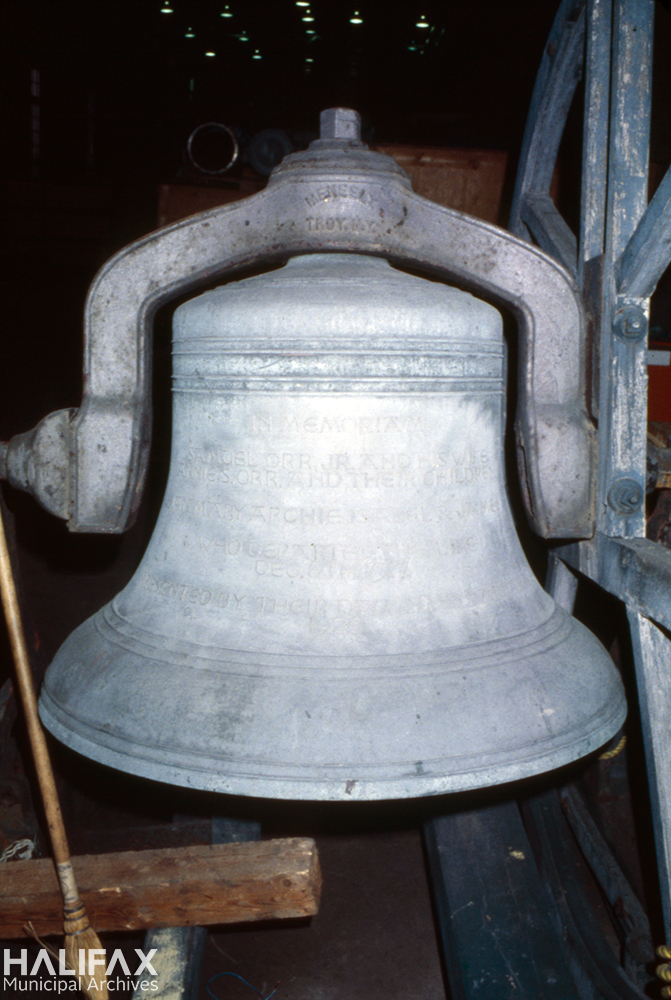 Colour photograph of a church bell.