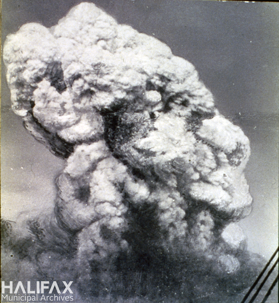 Black and white image of a large cloud of smoke