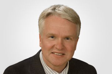 A photo of Councillor Tim Outhit, District 16