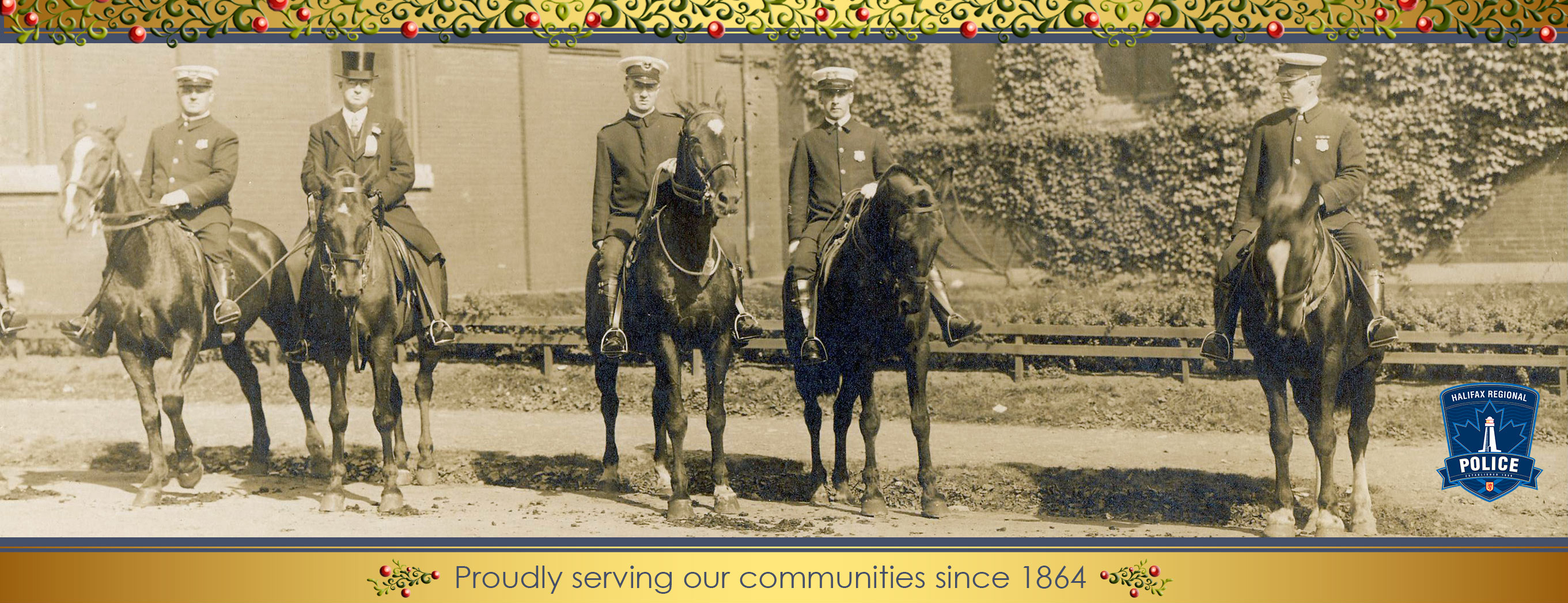 Photo of the HPD Mounted Squad in 1902 accented with holiday garland.