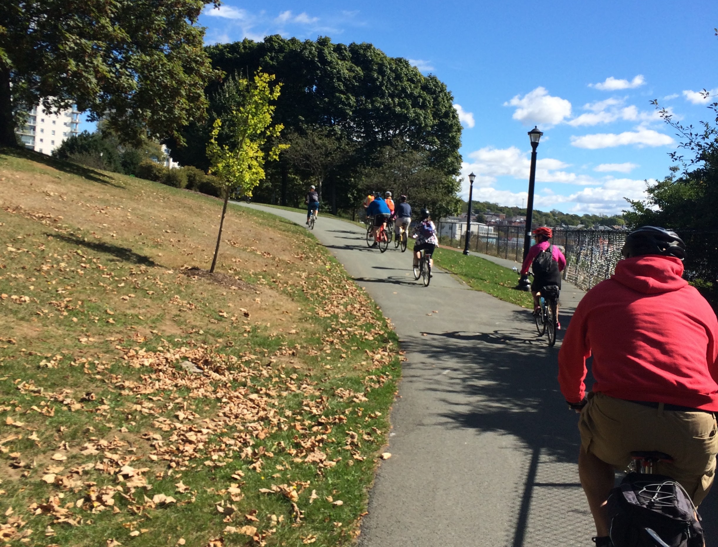 People cycling on the Dartmouth Harbourfront multi-use pathway. 