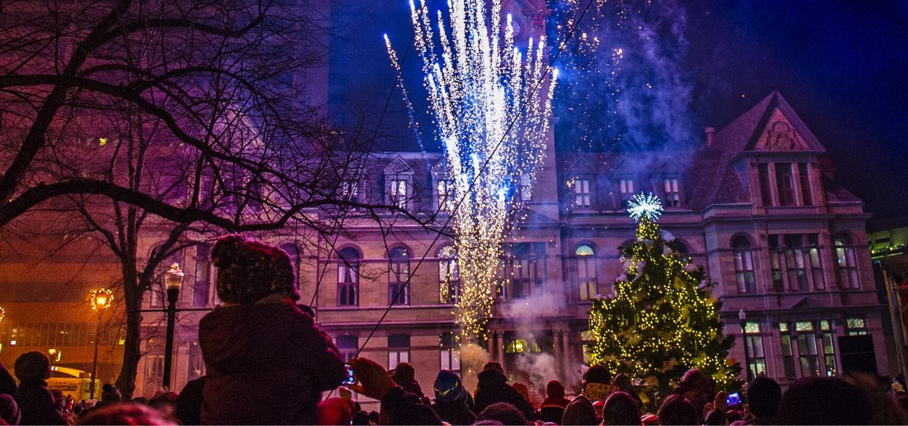 child watching fireworks at tree lighting