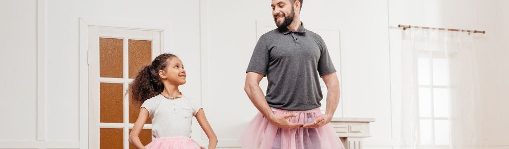 guy dances with child