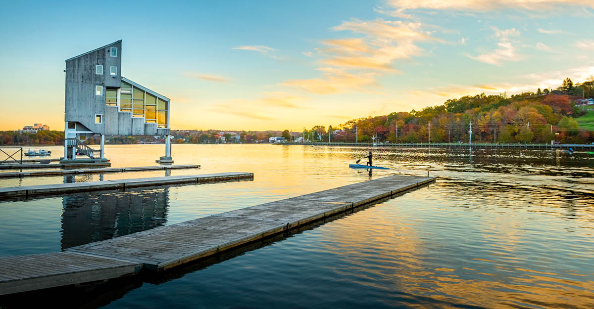 An image of the Judges Tower, docks and a canoe on Lake Banook, Dartmouth