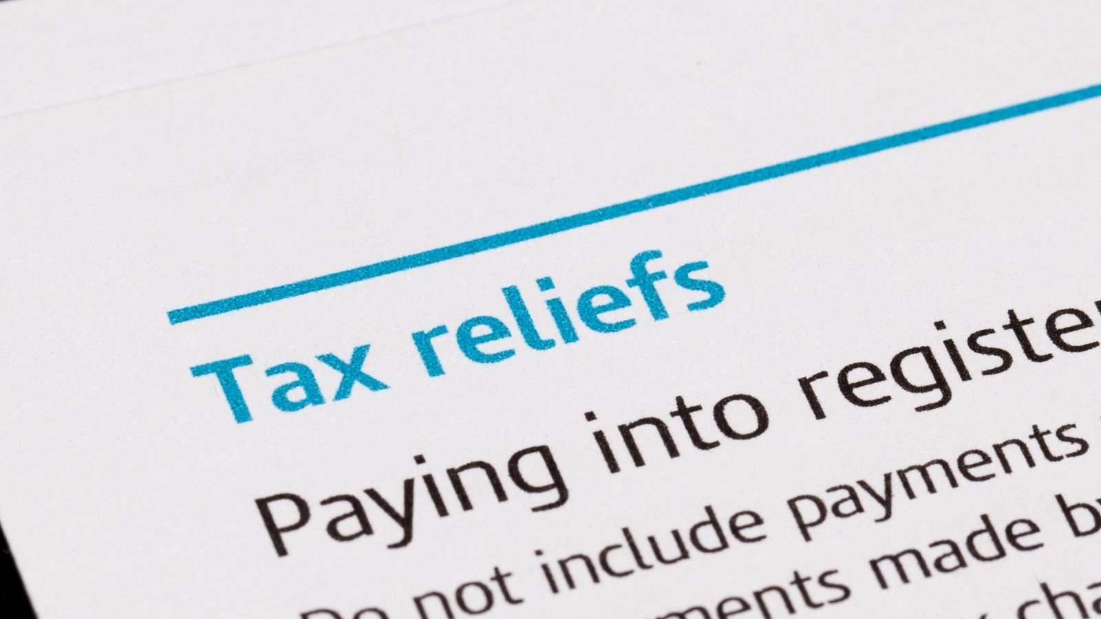 An image of a piece of paper that says "tax reliefs"