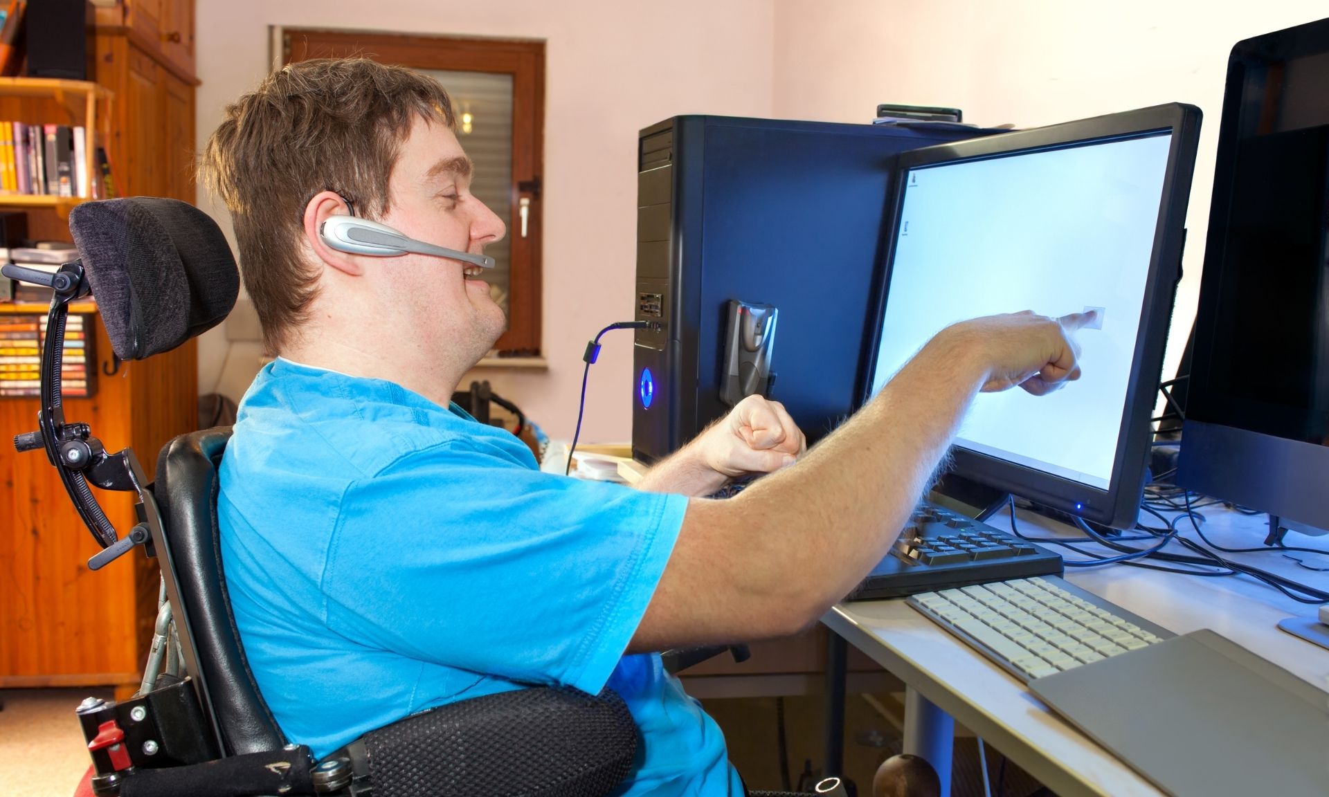 an individual with disabilities using a computer