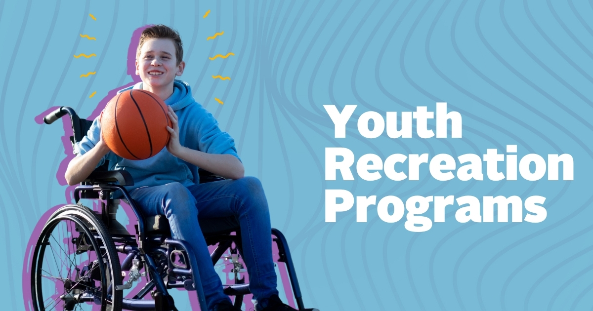 a youth in a wheelchair holds a basketball
