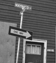 Maynard street sign and one way sign