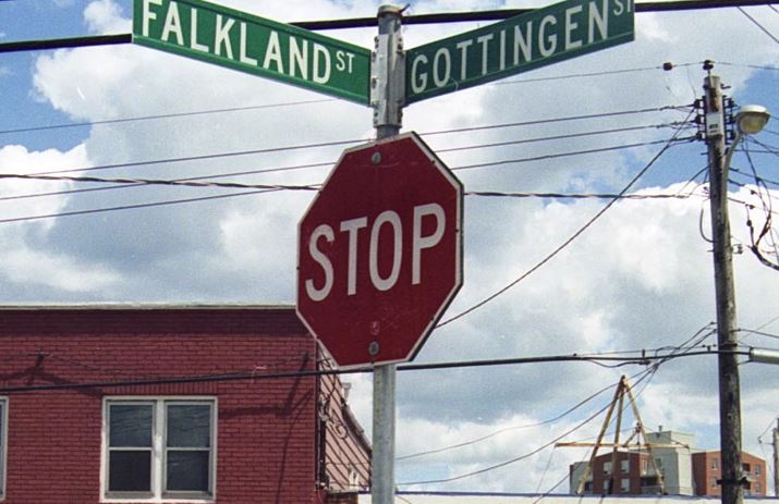 Stop sign with Falkland and Gottingen street signs