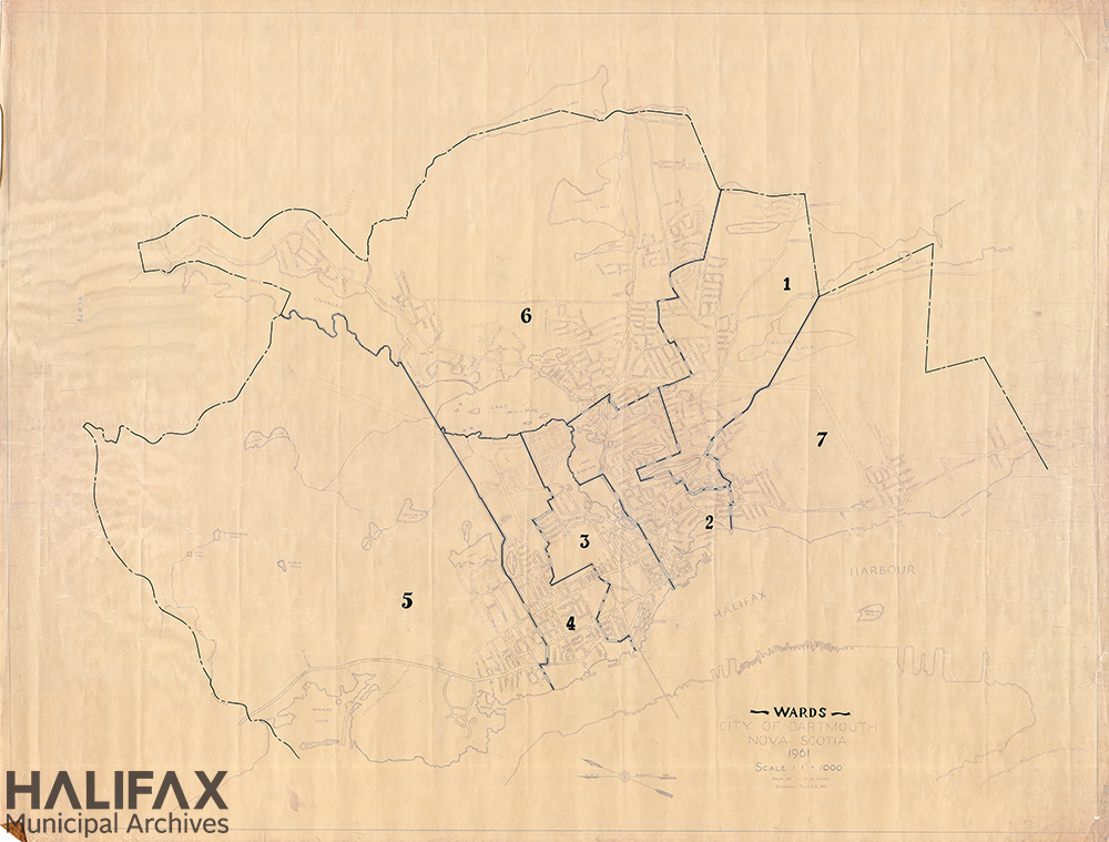 Sepia map of Dartmouth showing street lines with numbered ward boundaries drawn overtop in bold.