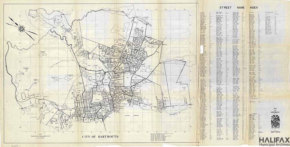 Black and white map of Dartmouth showing streets, public buildings, and natural features, with a street name index on the right hand side of the image.