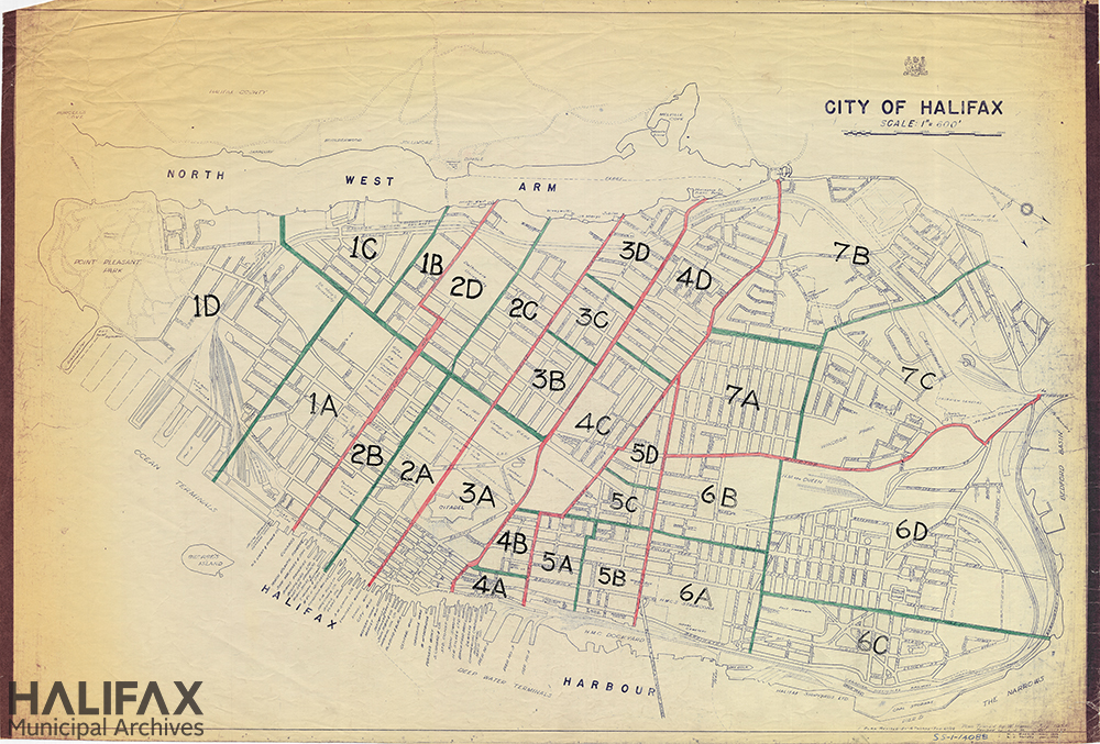 map with blue lines showing the Halifax peninsula, including some building footprints and walking paths, with electoral wards drawn overtop and labelled.