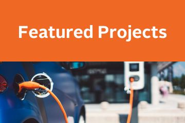 an electric vehicle charging with the words featured projects overhead
