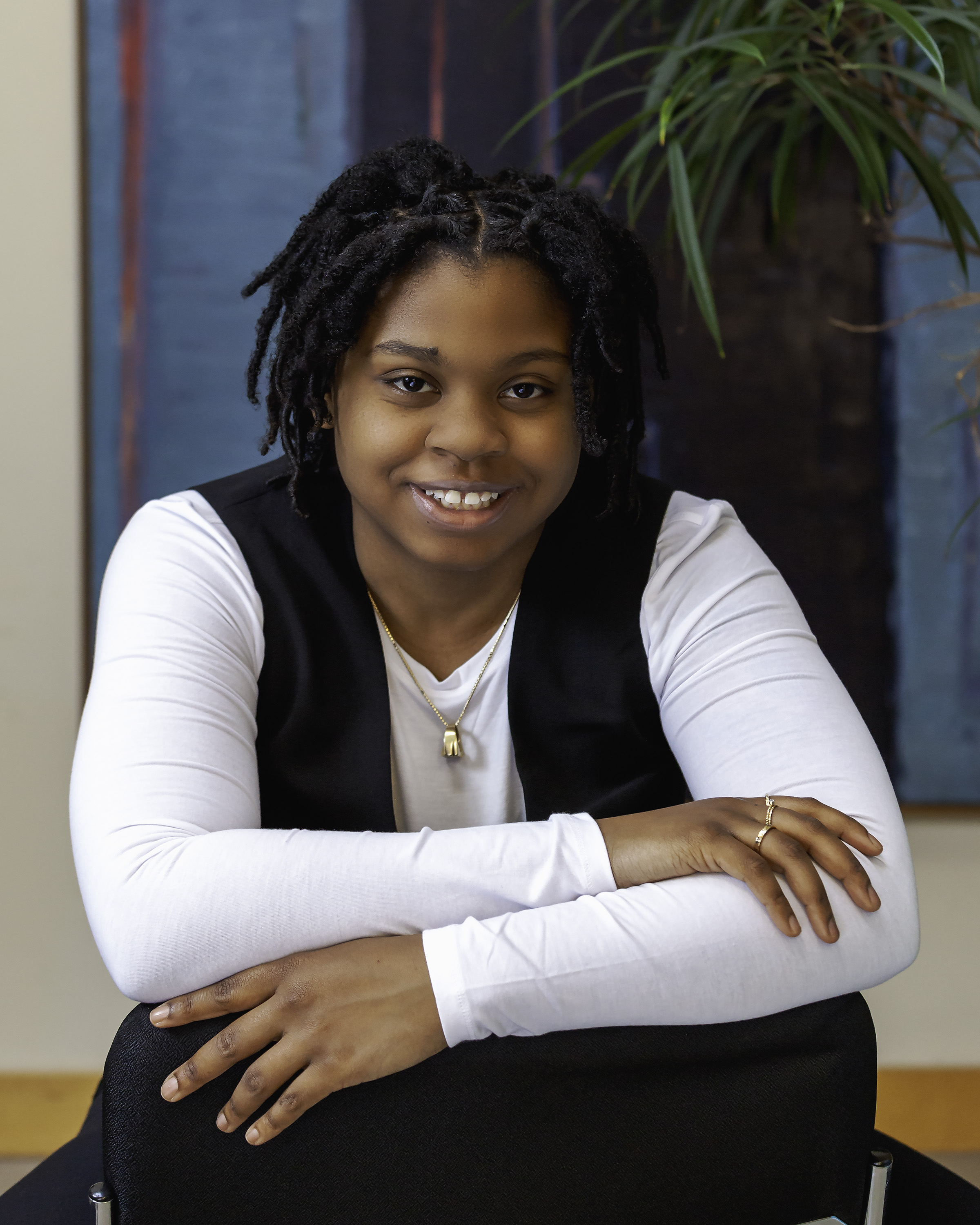 A photo of 2024-2024 Municipal Youth Poet Laureate, Asiah Sparks (photo by Sabrina Allison)