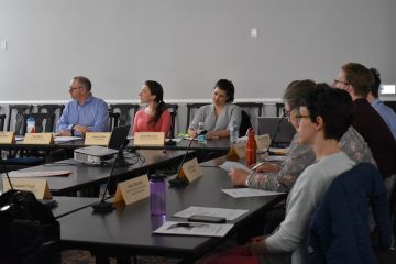 Members sit in Halifax Hall during a Committee meeting