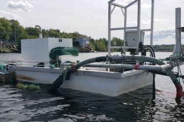 Weed harvester on Lake Banook
