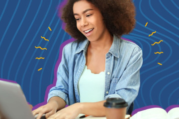 A youth is looking at a computer