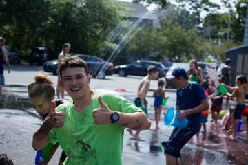 A group of children and youth playing at a day camp