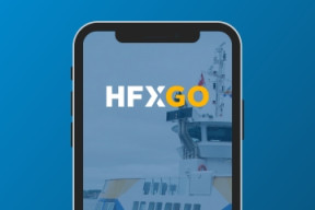 Image of the top half of an iphone. The text reads HFXGO and is displayed over a photo of the ferry